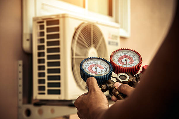 Professional Hvac technician working in Oyster Bay, NY